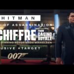A man in a black suit is walking away from a casino table