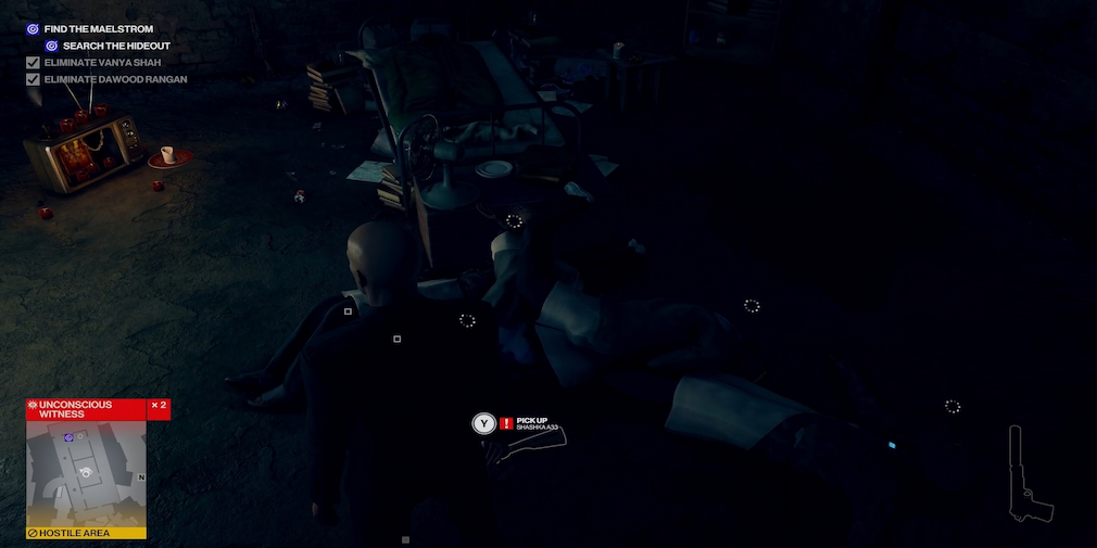 A man stands over a pile of unconscious people